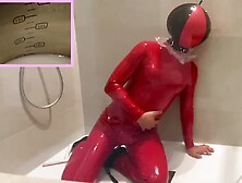 Four Liters Enema In Pvc Catsuit And Latex Inflatable Mask