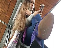 Pretty Teen In Interesting Purple Boots Filmed By Voyeur At The Bus Station