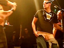 Guy stripped on stage by band member