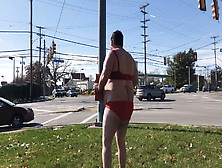 Ryan Geraghty Standing In The Busy Intersection In Just His Bra And Panties