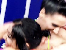 Brunette hair lesbos jump in a pool with food to wrestle and their large melons