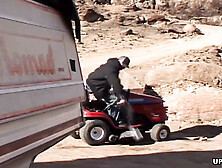 Naked blonde Leah Luv butt-sex mounts with giant dong.