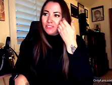 Brunette with a nose ring worshiping her toes in the chair