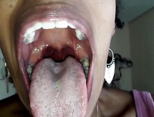 Ebony Girl Opens Her Mouth Wide And Pulls Out Long Tongue