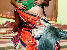 Hot Tamil mature stepmom Krishnarony seduces her young stepson for a steamy encounter