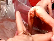 Sexy lesbian girls getting covered with poop