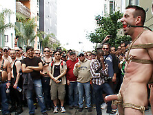 Muscle Slave Is Stripped Naked,  Used And Humiliated While Hordes Of People Take Photos.