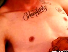 Tattooed dude enjoys smoking cigars and gently jerking off