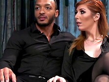 Suspended black slave sniffing pussy to busty dominatrix