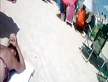 Beach Voyeur Films Woman's Asses In Bikini