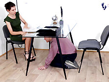 Euro boss lady gets her hot feet in high heel shoes worshiped by an employee at work