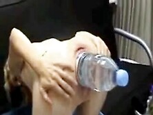 plastic water bottle stretches out her pussy