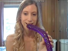 This Babe takes a giant sex-toy in her wazoo