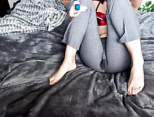 redhead wets leggings during rock hard orgasms from wand sextoy