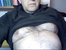 62 years old man from Italy demonstrates his hairy torso
