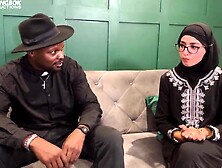 Muslim Aaliyah Yasin is blessed by Father Dimitri's holy water