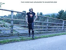 Crossdressed Outdoors On A Motorway Bridge