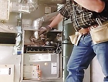 Hvac – Dad Working On Customer's Heater