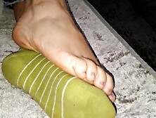 This babe lazily takes off her socks whilst I film her