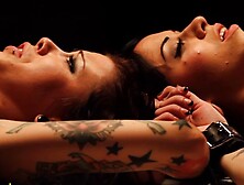 Bent and restained lesbos toyed