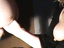 She is fisting him till he cums