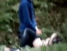Candid Young couple caught fucking in the bushes