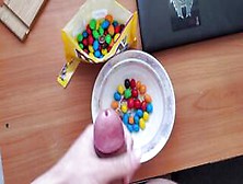 The Student Adds The Most Delicious Sauce To His M&m's