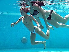 Two Bikinis Girls Get Naked In The Pool For A Swim