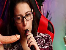 Woman With Glasses Sucking Dildo Sensually