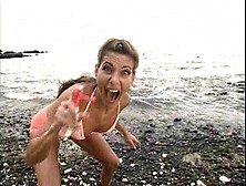 Alexandra Silk has a blast riding a cock on a great beach