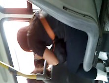 Beautiful Brunette With Gym Pants On The Bus