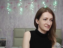 Brunette amateur with naked shoulders on webcam