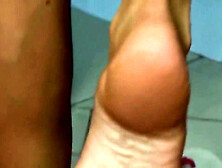 I wish you could see his face when I wrap my feet with red toe nails around his dick :)