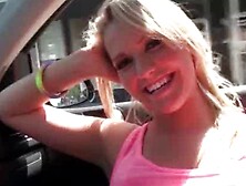 Blonde in glasses flashing big tits in the car