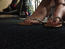 My female colleague displays her hot feet in flip-flops on my hidden camera