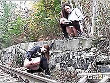 Friends Piss By The Railroad Tracks