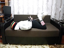 Encasement Bondage In Sweatpants Striped Socks And Slipper Boots