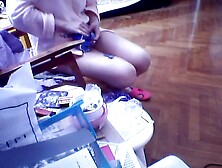 Hacked Laptop Camera.  Woman In Underwear Doing Needlework