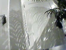 Girl changing in changing room reflecting in the mirror