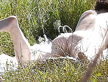 Nude Milf Sunbathing On River Bank.  Random Guy Watching And Filmed On His Smartphone.  Wild Beach.  Naked In Public.  Nudist Beach.