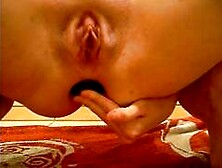 stuffing a big marble egg up my ass