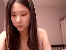 Young and cute Asian girl enjoying some pillow talk