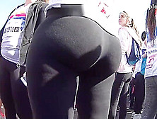 Ass In Black Leggings Standing Still