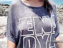 Fine Mom In Transparent T-Shirt On The Beach At Low Tide