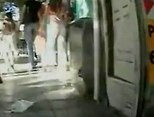 Great looking secretary in a black skirt walks sexy