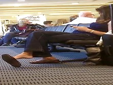 Hot voyeur girl with glasses playing with her lovely feet in candid place