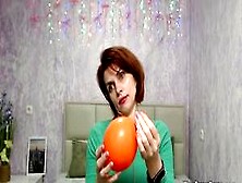 Redhead Milf Plays With Balloon On Webcam