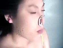 Young Asian Girl Holding Breath Underwater