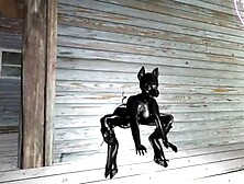 Rubber lady masturbate with a large dildo,  and has a strong cum-shot