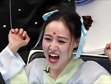 CHINESE FEMALE ANCHOR FEET TICKLE ON TV SHOW 4